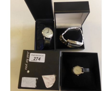 A mixed lot comprising a ladies Sekonda wristwatch, a gents Sekonda wristwatch and a further gents Fossil wristwatch on metal
