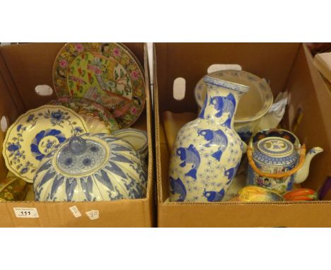 Two boxes containing a range modern Oriental ceramics to include various plates, large gourd shaped jar, vase decorated with 