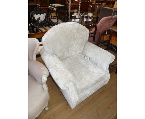 A excellent quality modern Laura Ashley grey armchair, raised on light wood supports.