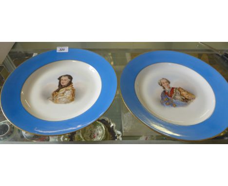 A pair of 19th Century French ceramic wall chargers, each hand painted with busts of Louis XV & Marie Leszczynska, diameter 3