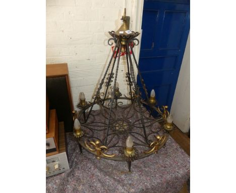 A mid 20th Century cast metal and brass hanging ceiling light, in the Mediaeval style 