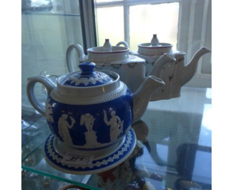 Two Newhall commode shaped teapots pattern no's. N191 & N186 together with a further Dudson small blue and white teapot with 