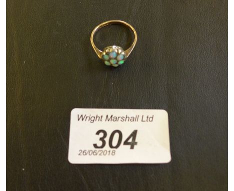 An opal and marcasite cluster ring, shank stamped 9ct, weight 2.2g