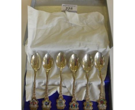 A cased set of six Australian sterling silver crested teaspoons, with enamel finials.