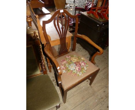 A 19th Century Hepplewhite style armchair, upholstered with a floral decorated tapestry seat