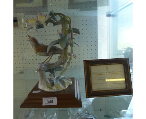 Royal Worcester Nightingale and Honeysuckle modelled by Dorothy Dowty, with certificate. CONDITION REPORT: Chips/losses to se