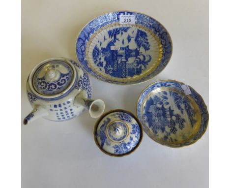 A mixed lot of oriental ceramics comprising a small teapot, tea bowl and saucer decorated with willow pattern type design, an