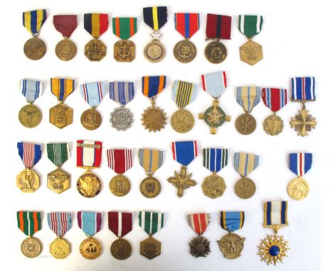 Collection of United States Service and Achievement Awards to Army, Navy, Air Force and Coast Guard. Includes Navy Distinguis