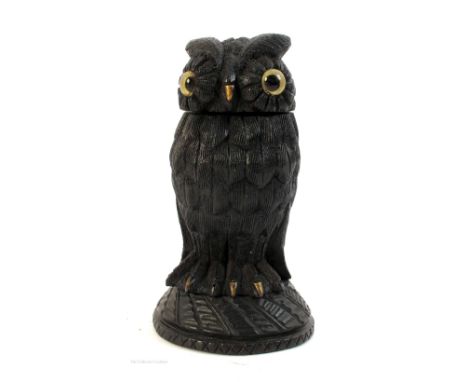 Victorian Irish bog oak novelty inkstand in the form of an owl, head lifts to reveal inkwell, brass beak and talons, on domed