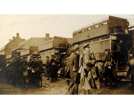 1915 Flanders WWI, photograph of British troops boarding buses. A large silver gelatin print of British Troops, led by two of