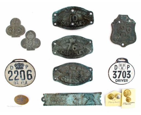 Irish Transport buttons and badges. A tunic and cuff button of the Cork and Muskerry Light Railway; a gilt Coras Iompar Eirea