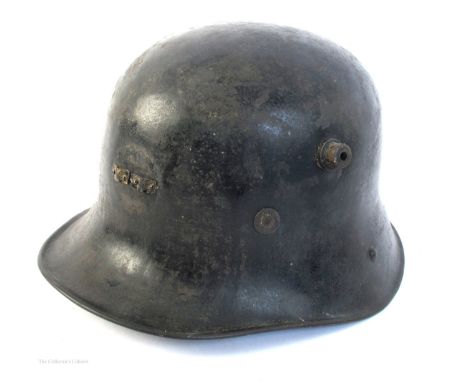 1927 pattern Irish Army helmet by Vickers. A coal-scuttle shaped helmet made by Vickers, in original finish, with leather and