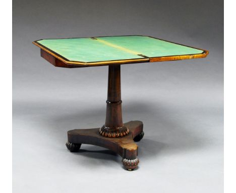 A William IV rosewood card table, early 19th century, the fold over top on central tapering column, on fluted bun feet, 75cm 