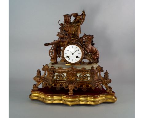 A French bronzed spelter and onyx mantel clock, late 19th century, mounted with a model of a man with a lurcher, the base of 