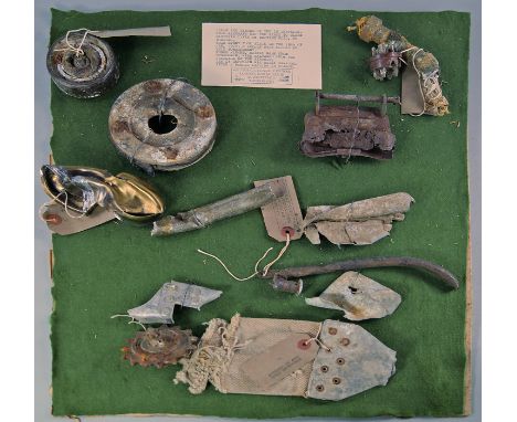 A collection of fragments from the German Airship Zepplin L3, 20th century, to comprise part of a hydrogen pipe, an engine co