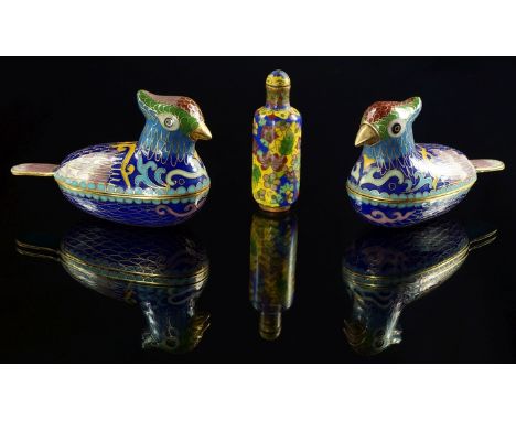 A pair of Chinese cloisonné enamel boxes, 20th century, modelled in the form of birds, in bright colours, together with a Chi