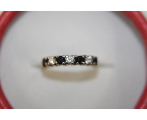 A 9ct gold &amp; sapphire half eternity ring size K 3/4 