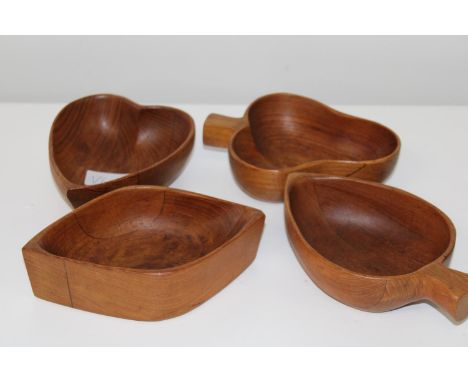 Four pieces of novelty treen playing card symbols 
