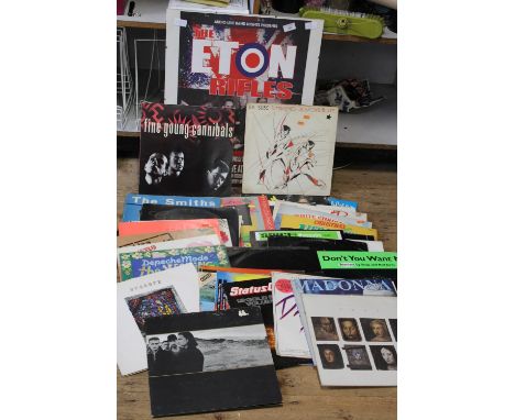 A selection of mixed genre LP records &amp; poster 