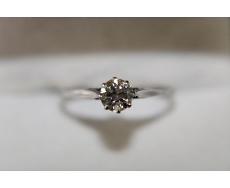 A 18ct white gold diamond solitaire ring (approx .5 of a ct ) size P 1/2 