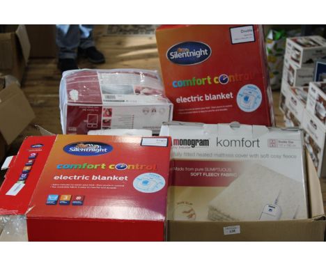 A qty of new &amp; slightly used electric blankets 