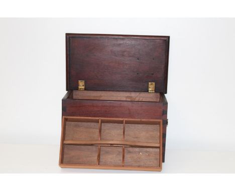 A vintage mahogany work box with inner tray