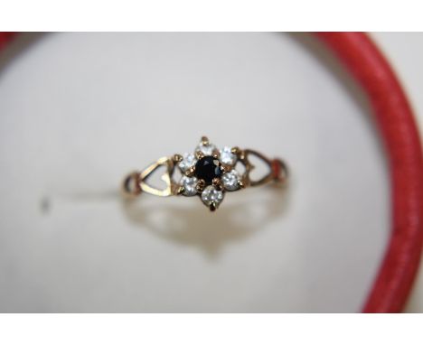 A 9ct gold sapphire cluster ring size L 