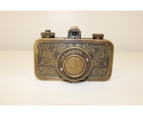 A vintage La Sardina camera in a brass bound case 