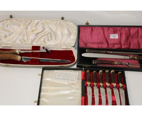 Three boxed sets of vintage horn handled cutlery 