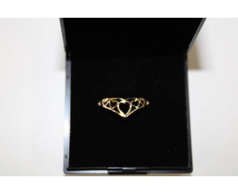 A 9ct gold wishbone heart ring size N 1/2 