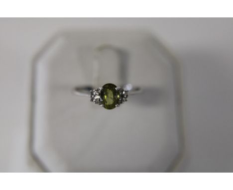 A 9ct white gold and gemstone ring 1.9 grams 