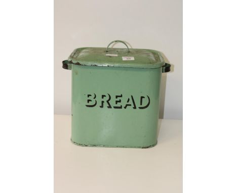 A vintage green enamelled bread bin 