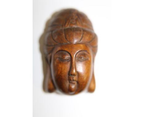 A signed box wood netsuke
