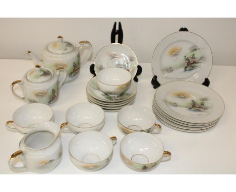 A Oriental eggshell porcelain tea service 