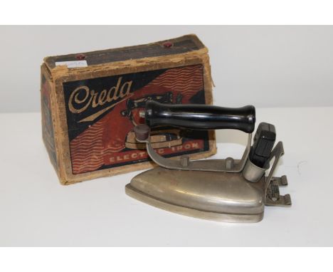 A vintage boxed Creda electric iron 