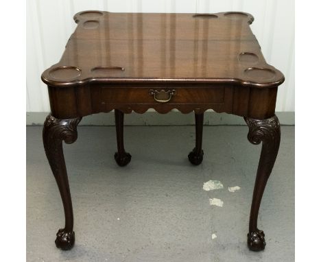 A George II mahogany fold over card table, c.1740, recessed counters, single drawer to front, cabriole legs carved knees with
