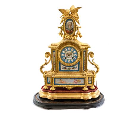 A 19th century French ormolu and porcelain mantle clock, the 3.5 inch blue and white enamelled dial with Roman numerals withi