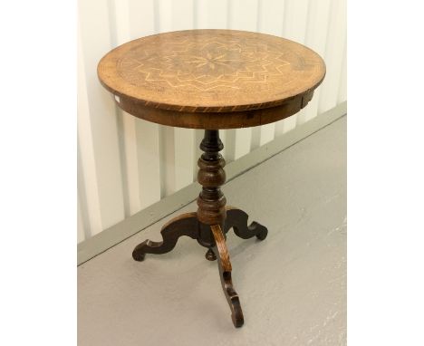 A Victorian walnut and parquetry inlaid circular topped tripod table, turned column, raised on three shaped legs, finial to u