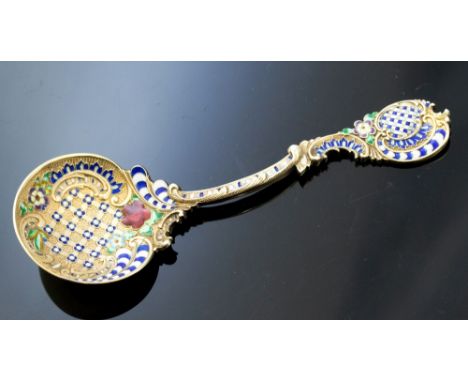 David Andersen, a Norwegian silver gilt and enamelled caddy spoon, cast in relief with Rococo scroll decoration to both sides