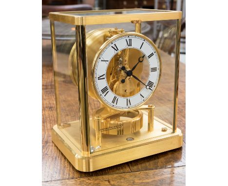A Jaeger Le Coultre Atmos bracket clock, glazed and gilt brass case, with instruction book