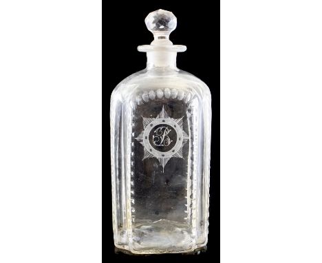 An early 19th century spirit decanter, square section with concave edges and lens cut bordered panels, the spherical stopper 