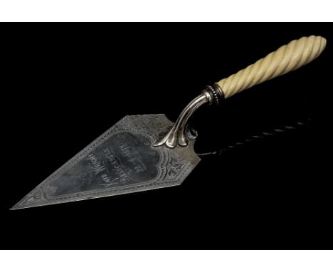 A Victorian presentation trowel with silver blade and worked ivory handle of wrythren  design, triangular blade engraved with