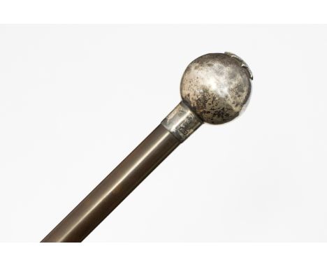 A WWI rhino horn officer's swagger stick, Coldstream Guards, silver pommel, early 20th century London hallmark, (date letter 