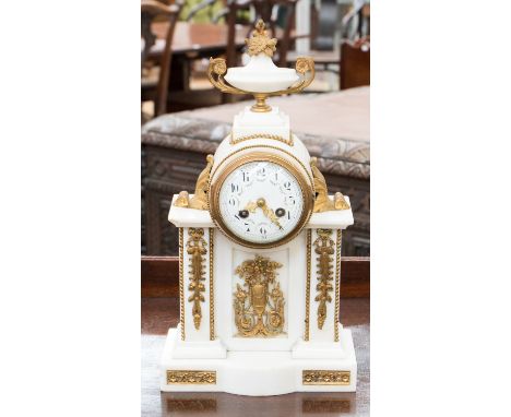 A French ormolu mounted white marble bracket clock, c.1870, of Baroque design, urn finial, enamel dial with floral swags and 