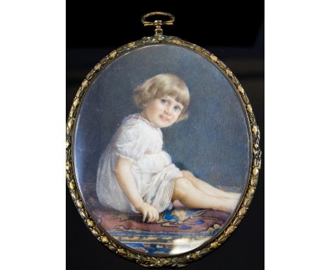 An oval portrait miniature of Mary Elizabeth Whedbee, aged two years, 1927, modelled seated on a patterned carpet, appears un