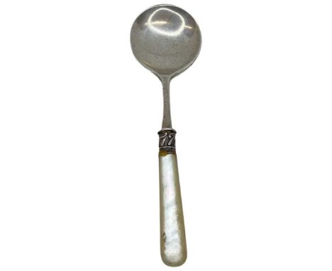 Mother of Pearl Silver Handled Caddy Spoon. Sheffield 1906, Cooper Bros.Length 11 cmsHandle has been glued back into place.