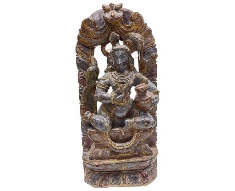 A Rajasthan Carved Polychromed Wood Panel of Shiva, 19th/20th Century.