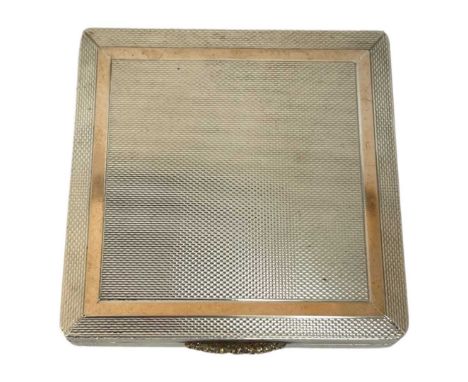 Silver Engine Turned and Gold Clasp Compact, 96g. Birmingham 1963 Mappin &amp; Webb Ltd. gold inlay6.5 cm diameter Good condi