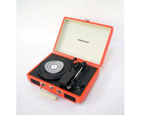 'CROSLEY' PORTABLE CASED RECORD PLAYER
model number CR8005A-OR, contained in a bright pink carrying case with integrated spea