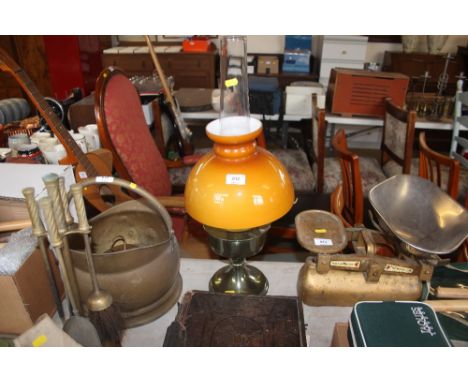 An oil lamp and chimney